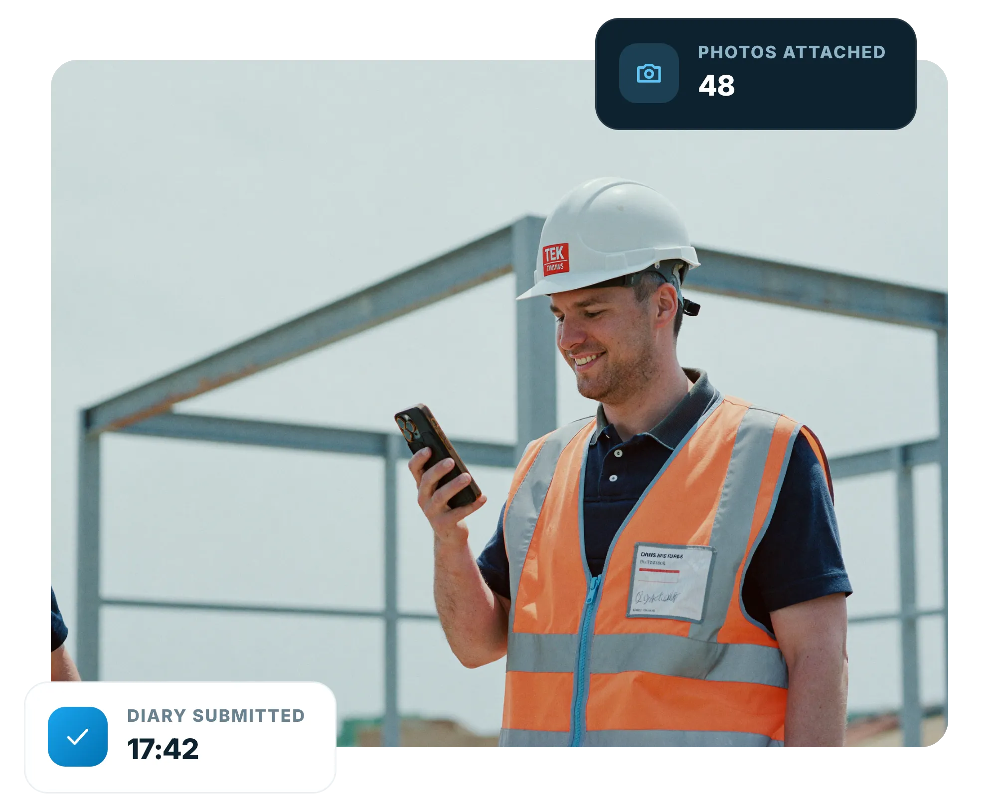 Site supervisor recording the day’s progress on a phone on a construction site