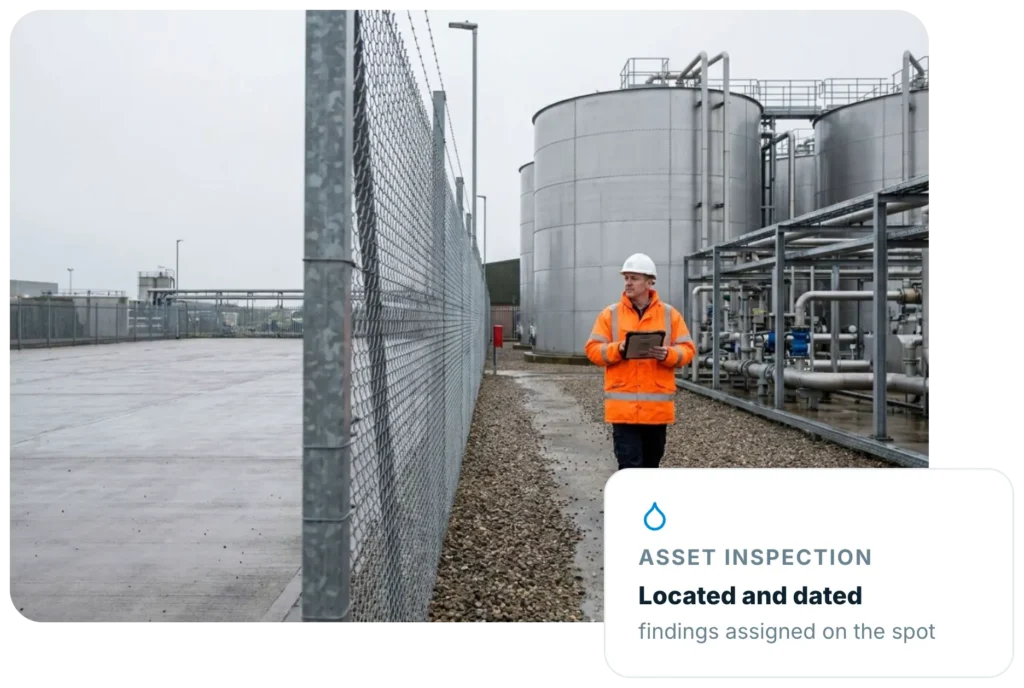 Utilities inspector walking a treatment works compound with a tablet, with an Insite asset inspection card located and dated